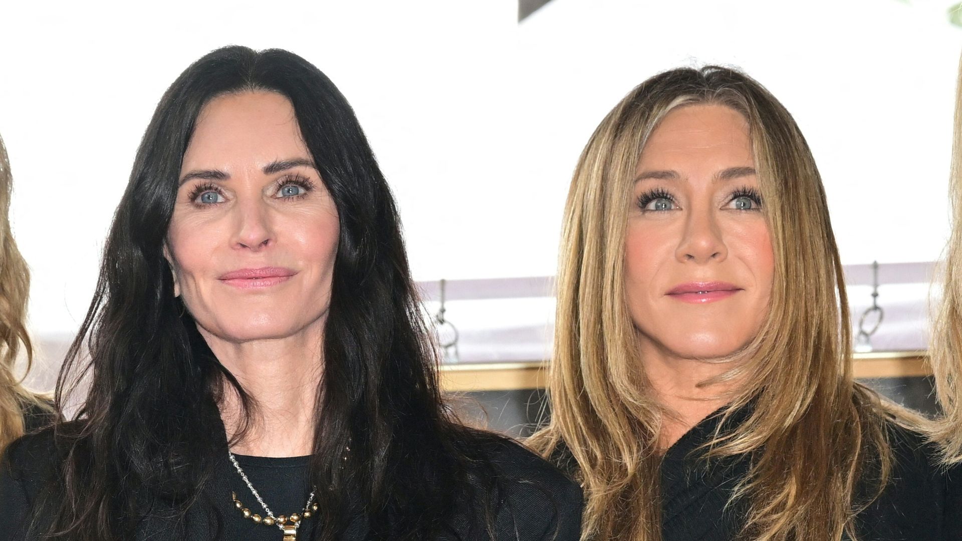 Laura Dern,Courteney Cox, Jennifer Aniston, and  Lisa Kudrow pose for a photo with Cox's newly unveiled Hollywood Walk of Fame star 