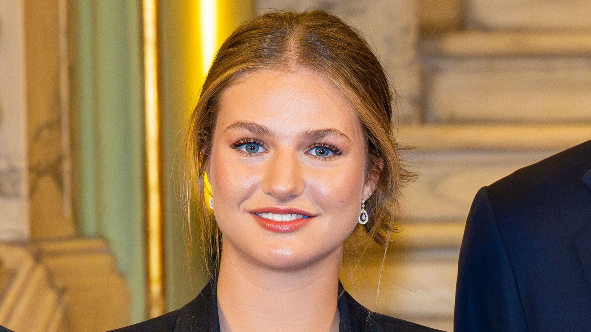 Princess Leonor wearing a suit and hair up