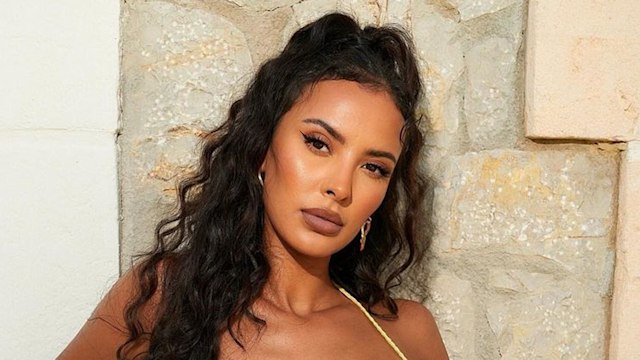 Maya Jama posing in yellow bikini 