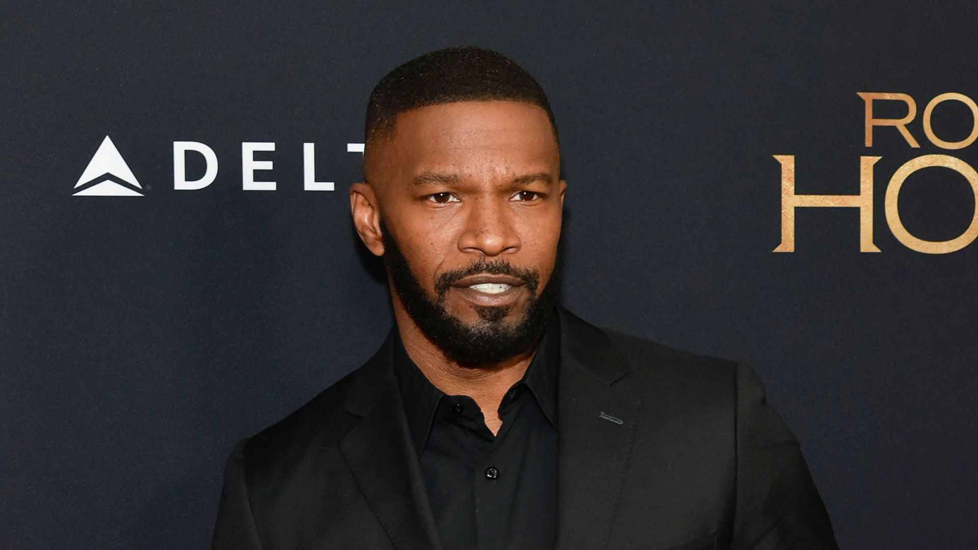 Jamie Foxx poses on the red carpet at "Robin Hood" New York Screening  at AMC Lincoln Square Theater on November 11, 2018 in New York City