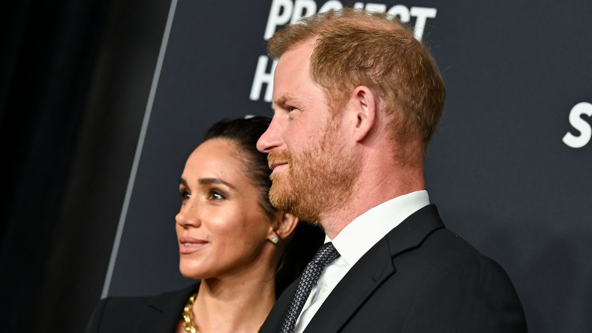 Prince Harry and Meghan 'sat on the floor' in distress as their dog underwent emergency surgery