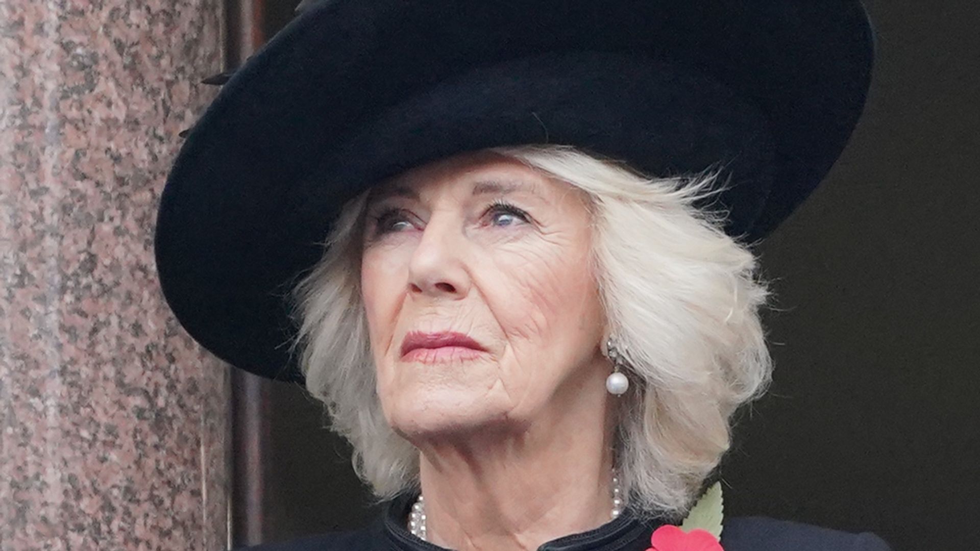 Queen Camilla on a balcony at the Foreign, Commonwealth and Development Office (FCDO) on Whitehall, during the Remembrance Sunday service at the Cenotaph, in Whitehall, London. Picture date: Sunday November 12, 2023. 