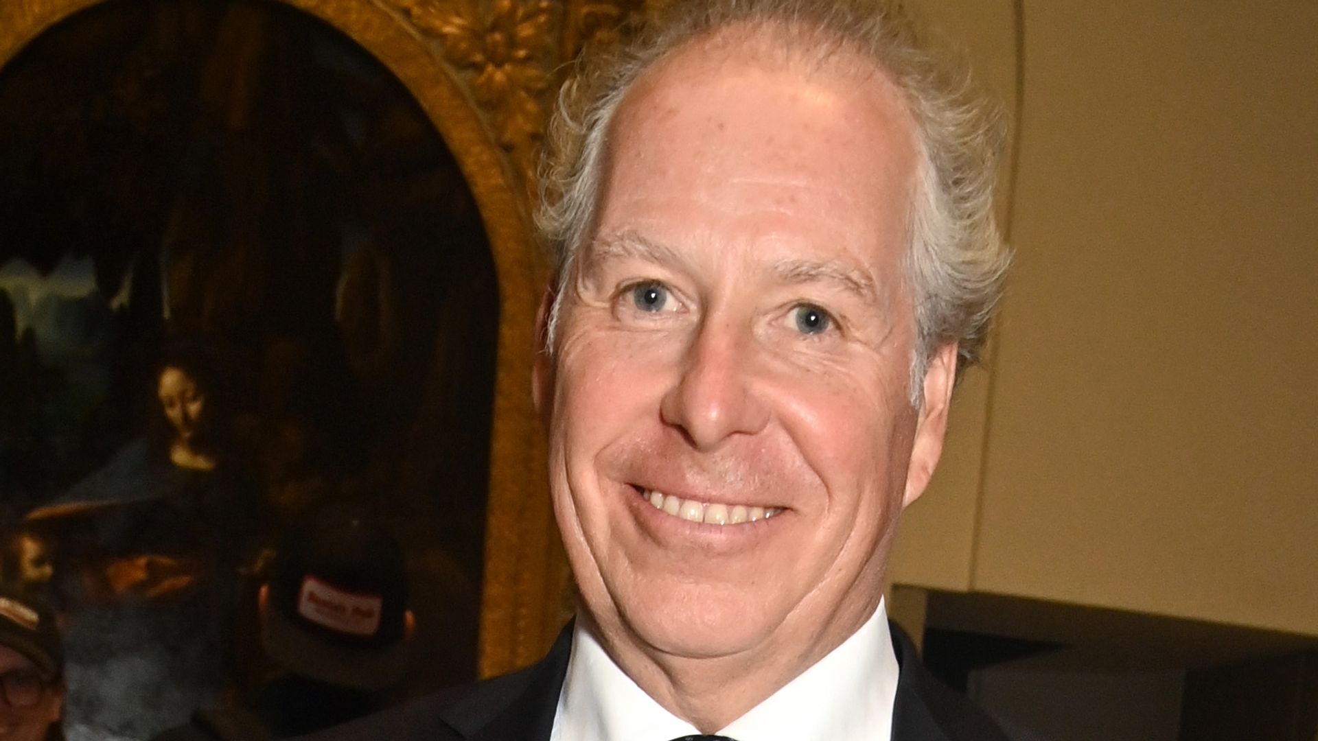 David Armstrong-Jones in a black suit