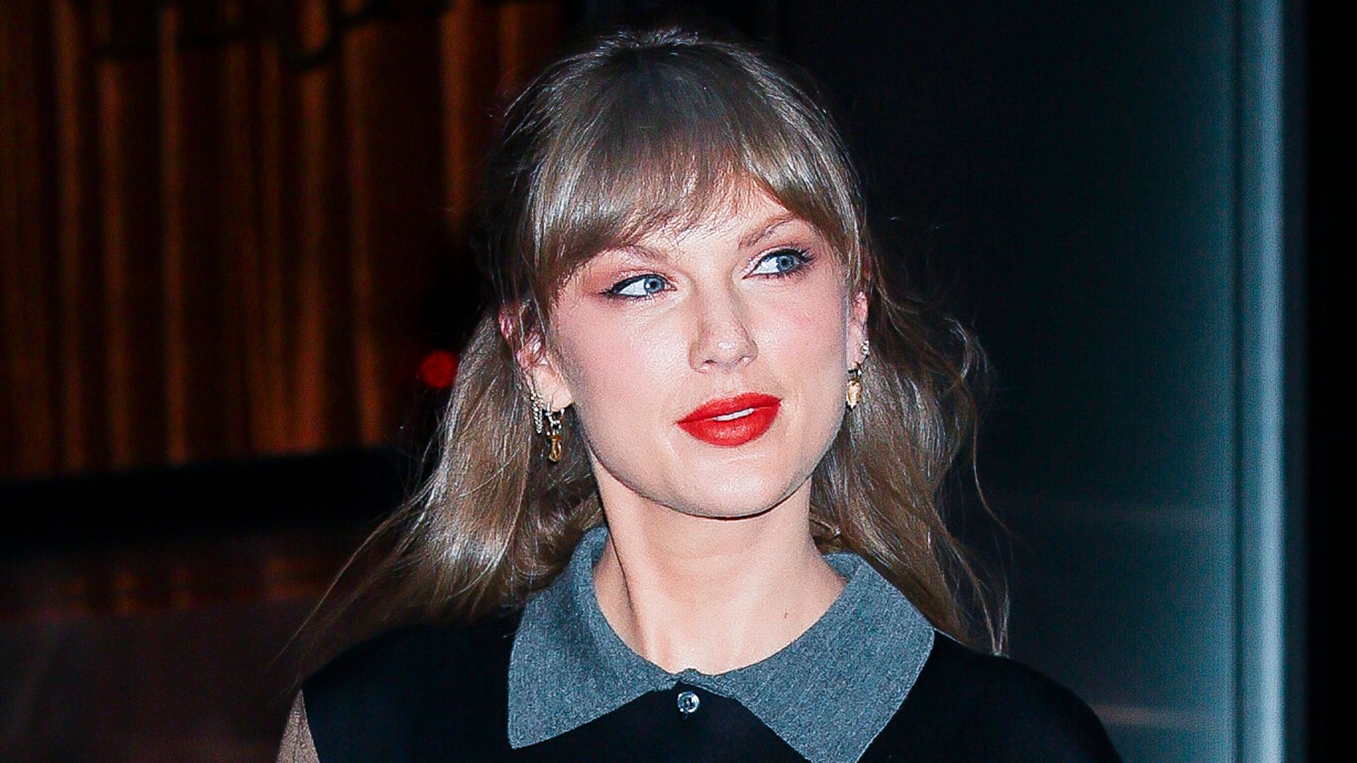 photo of taylor swift in mini skirt and polo shirt