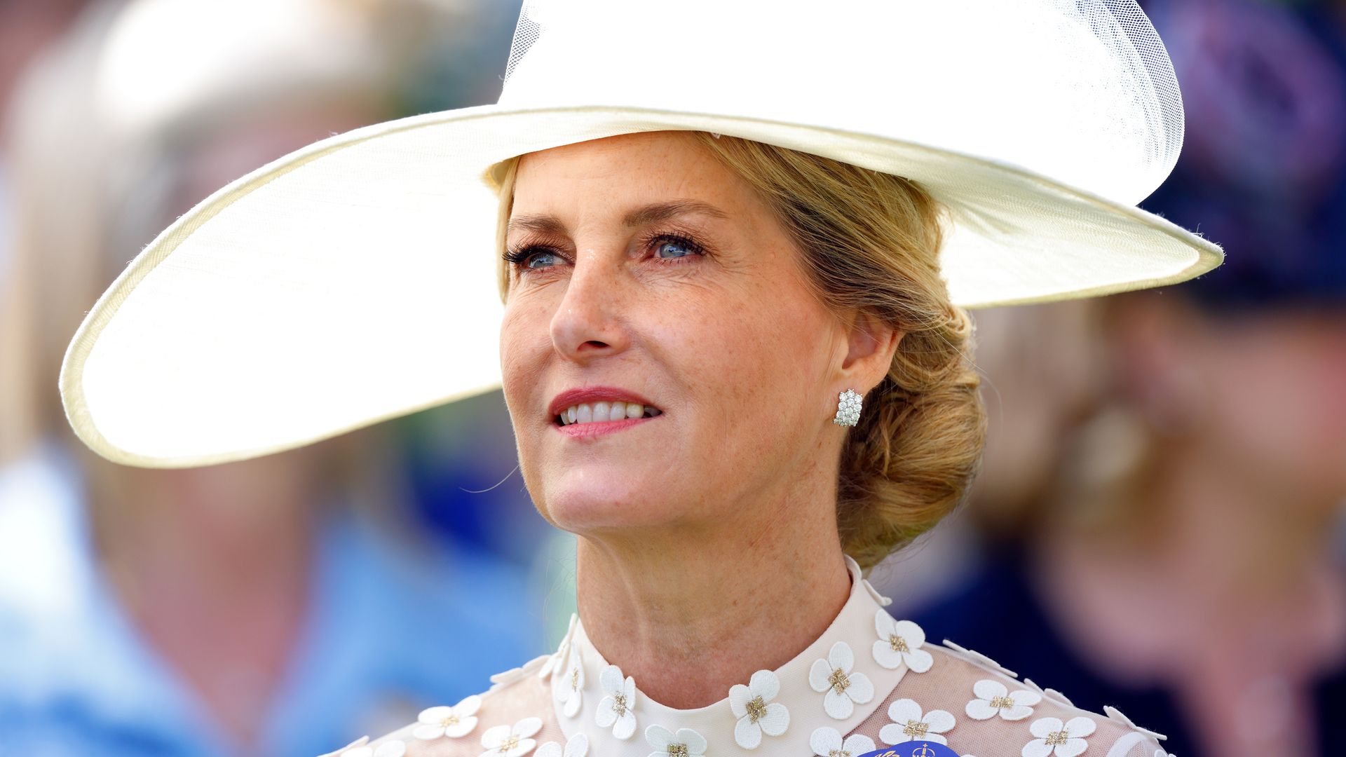 Sophie, Duchess of Edinburgh looking up in white hat