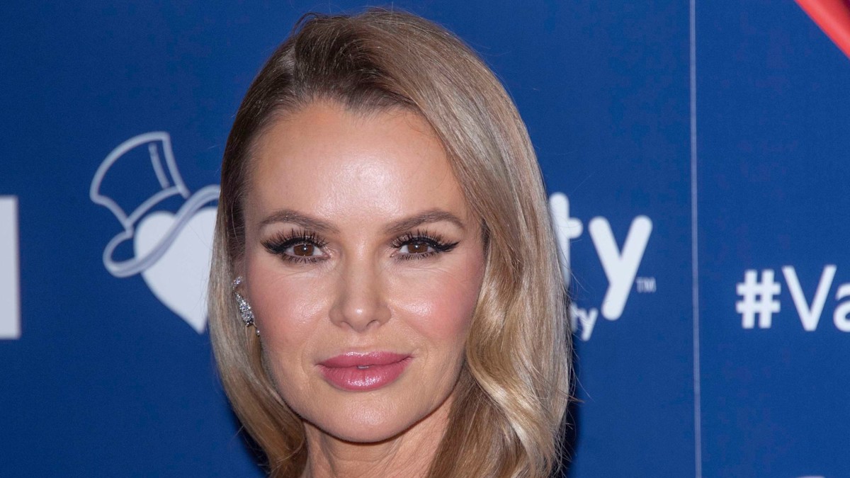 Amanda Holden wows in lacy halterneck jumpsuit | HELLO!