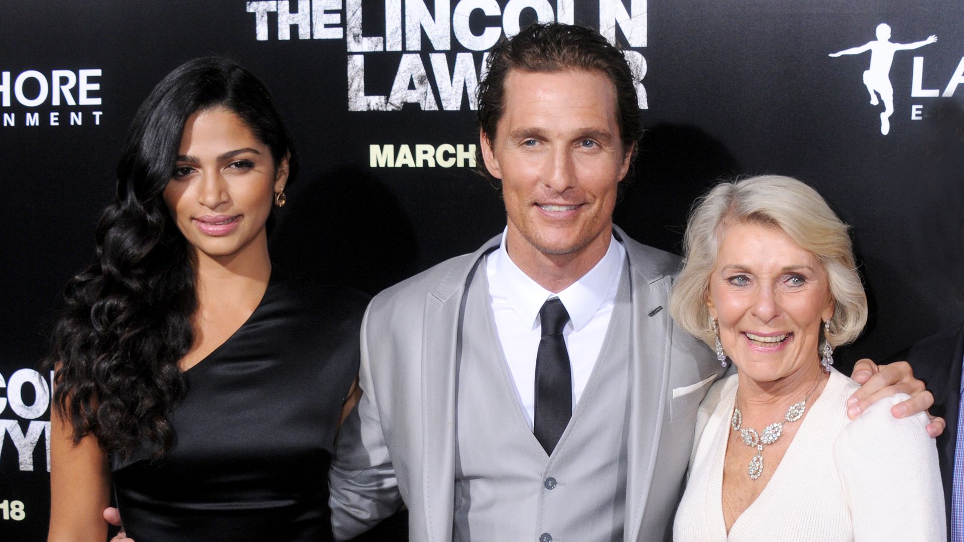 Camila Alves, Matthew McConaughey and mom Mary Kathleen McCabe arrive at the Los Angeles Premiere of "The Lincoln Lawyer" on March 10, 2011 in Hollywood, California