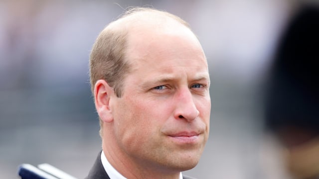 prince william wearing suit in carriage 