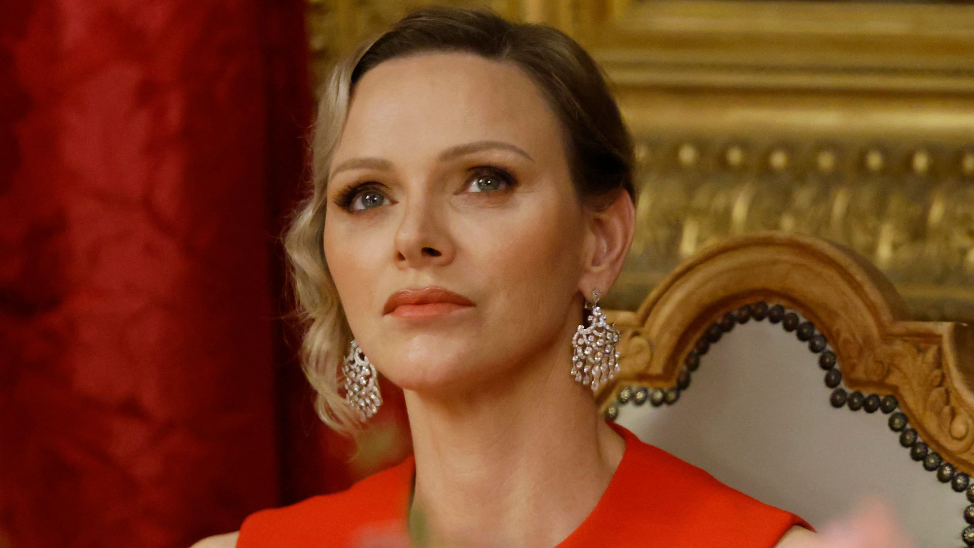 Princess Charlene of Monaco listens to speeches at the Prince's Palace during a state dinner as part of France's President two-day state visit in Monaco ahead of the Unoc3 on June 7, 2025. The EU will present the new roadmap at the June 9-13 UN Ocean Conference (UNOC), which is set to draw some 70 heads of state and government to southern France. (Photo by Ludovic MARIN / AFP) (Photo by LUDOVIC MARIN/AFP via Getty Images)          