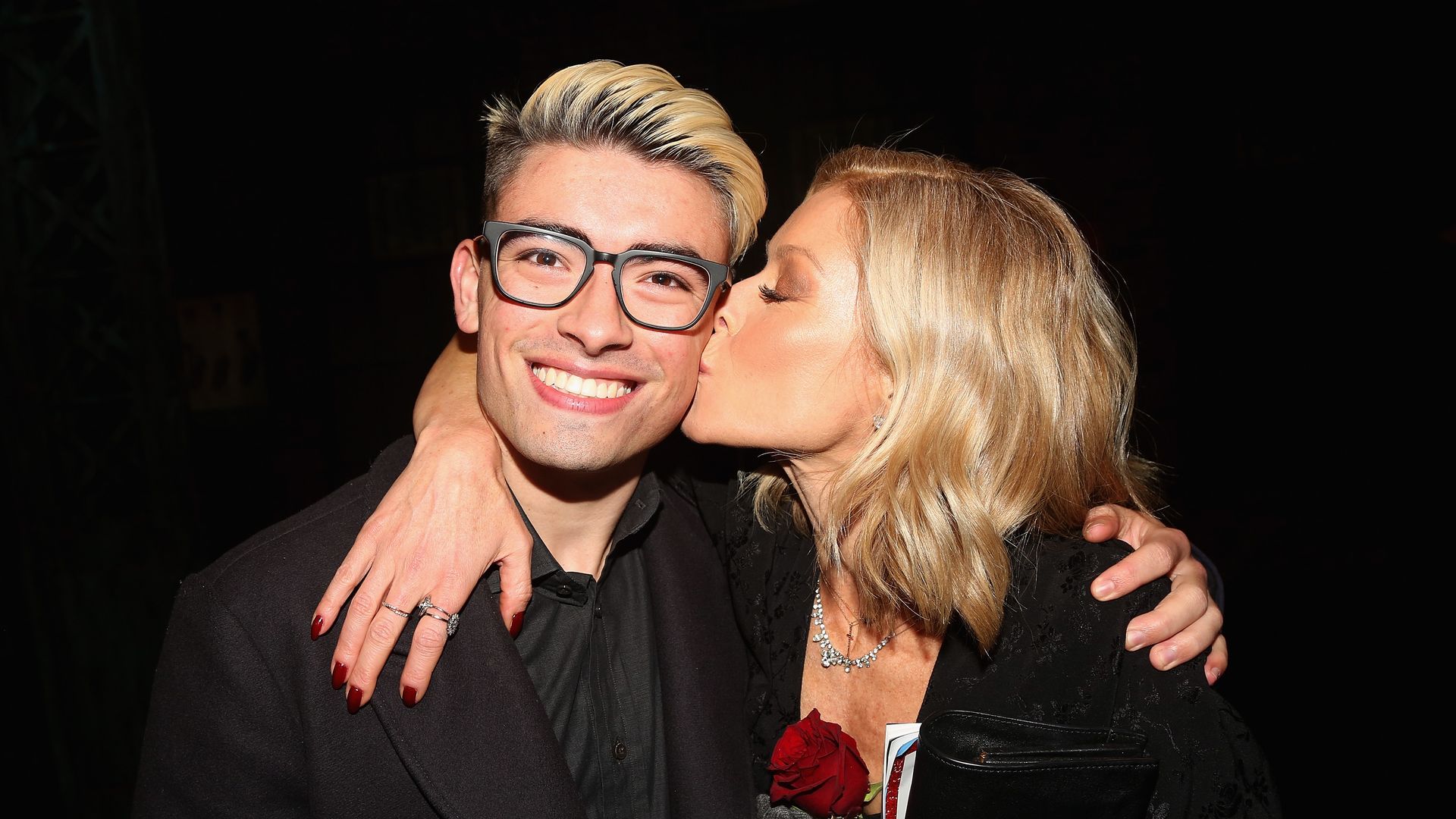 Michael Consuelos and Kelly Ripa pose backstage as Jake Shears of the rock group "The Scissor Sisters" makes his Broadway debut in the hit musical "Kinky Boots" on Broadway at  The Al Hirschfeld Theatre on January 8, 2018 in New York City.