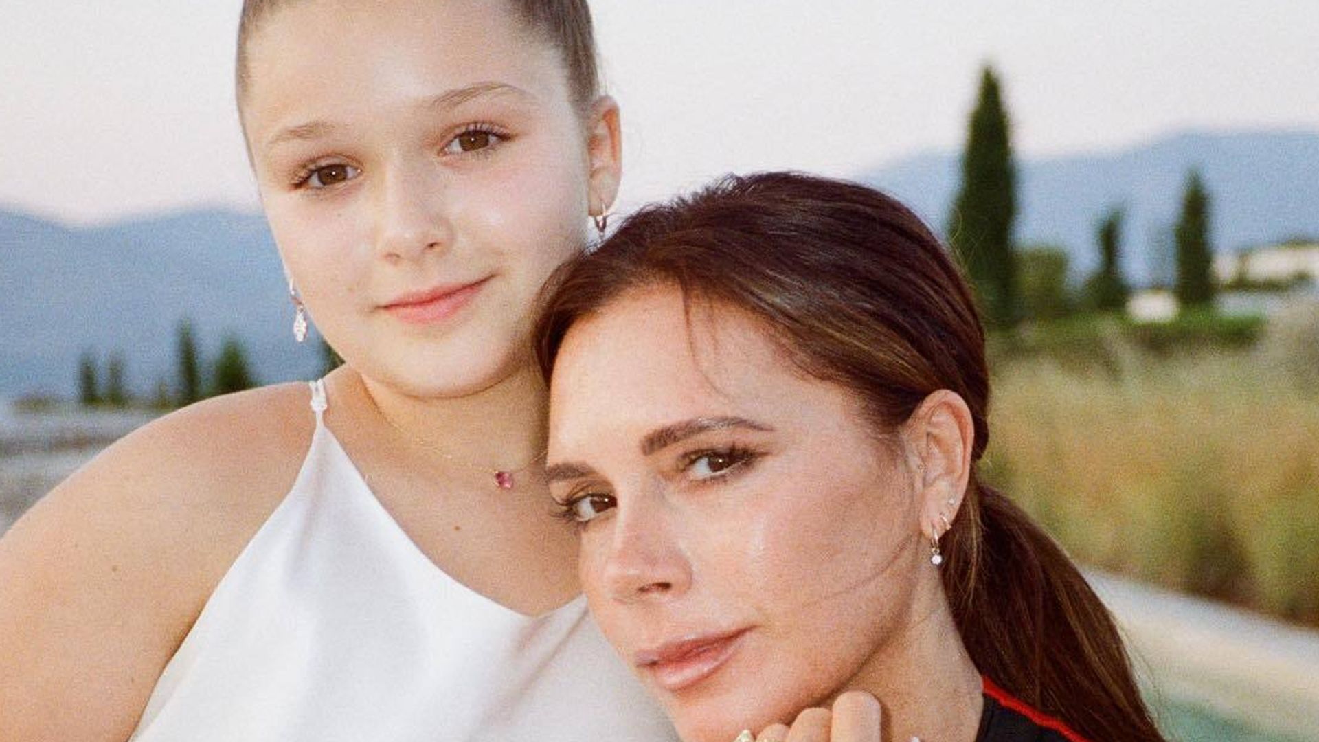 Harper Beckham and Victoria Beckham on holiday