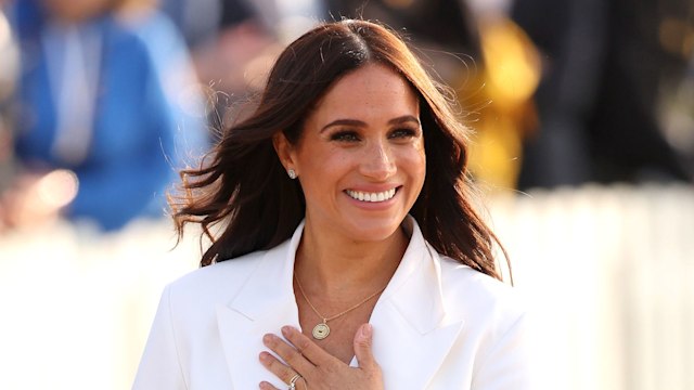 Meghan Markle in white coat