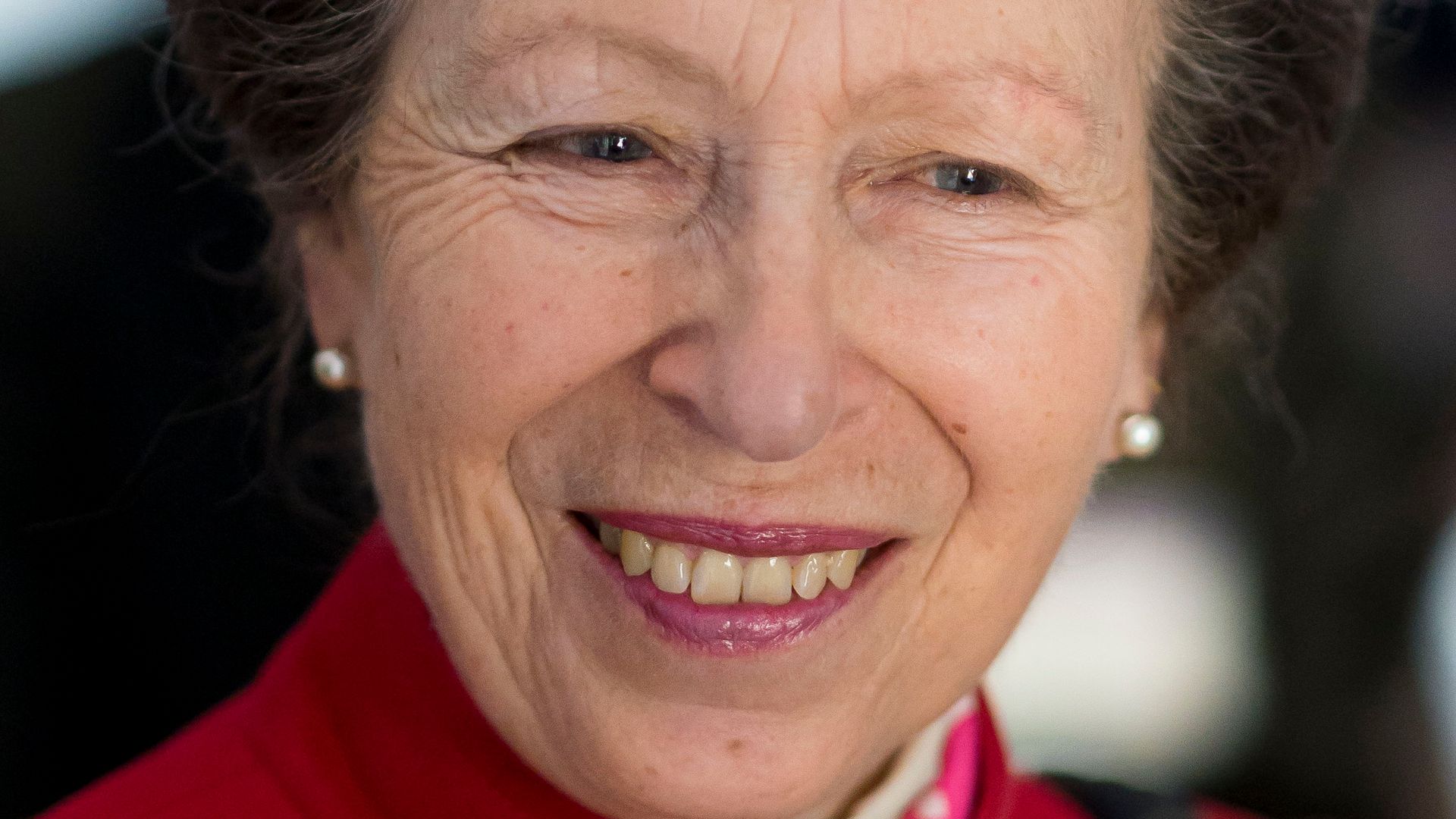 Princess Anne close up in red coat