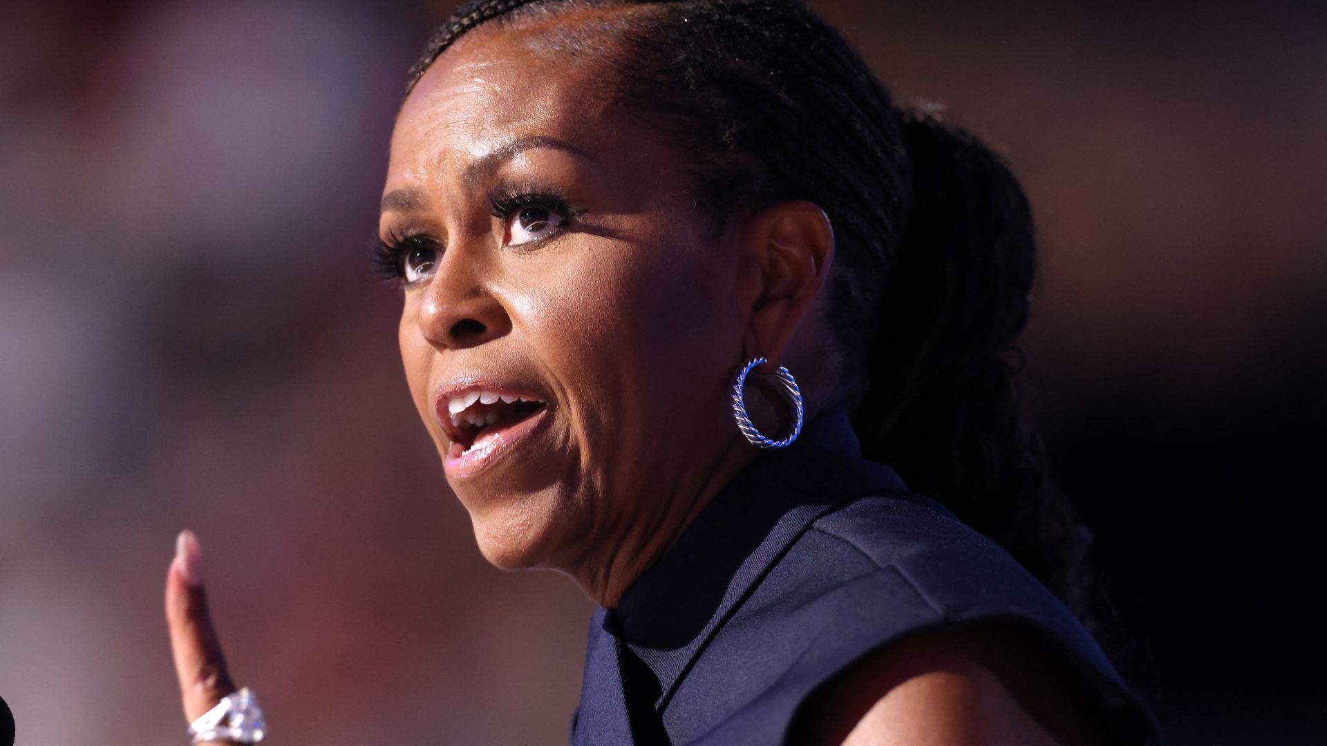 Michelle Obama pointing and talking