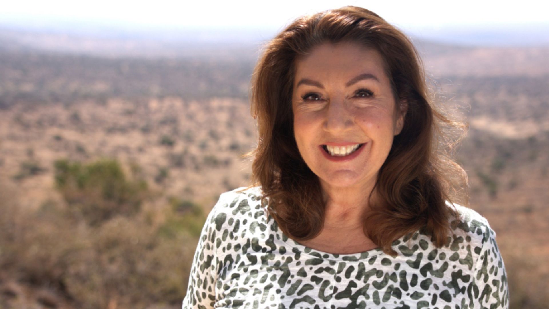 Jane McDonald in animal-print shirt