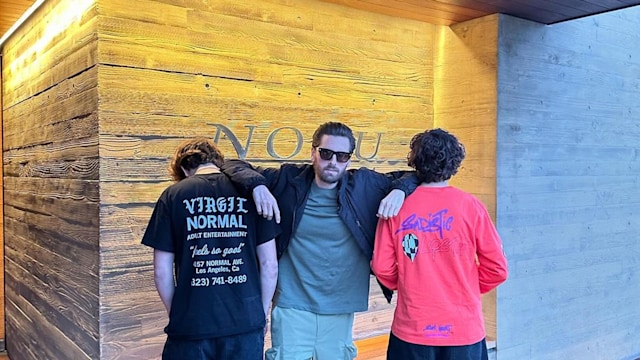 Scott Disick shared a photo with son Mason and his friend to mark the teenager's graduation from middle school