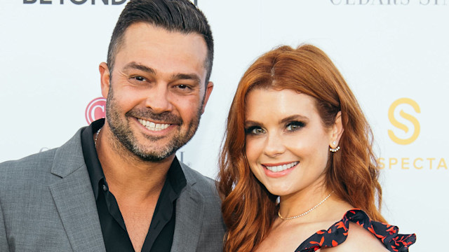 JoAnna Swisher Garcia with her husband Nick on red carpet