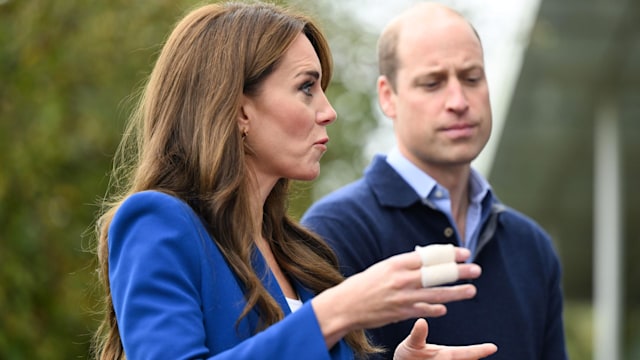 Prince William and Princess Kate looking serious
