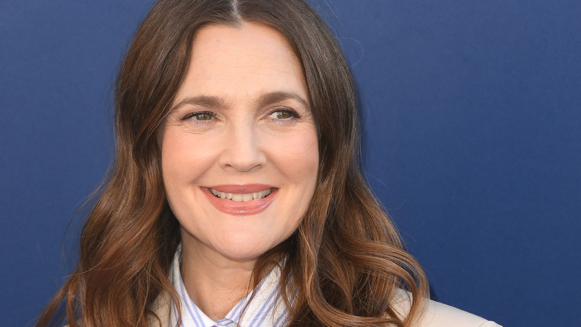 Drew Barrymore wearing a suit