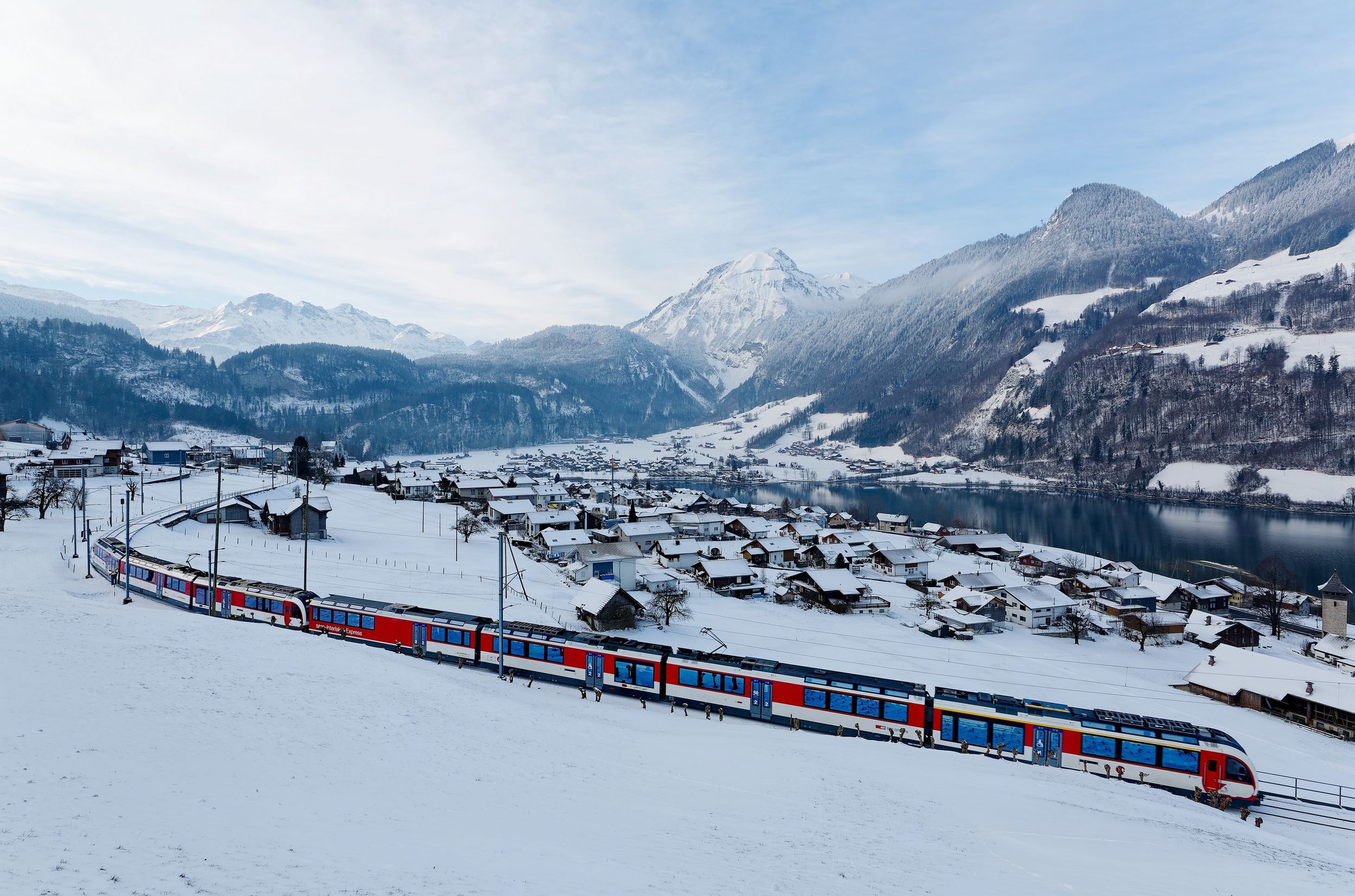 On,A,Cold,Snowy,Winter,Day,,Lucerne-interlaken,Express,Of,Zentralbahn
