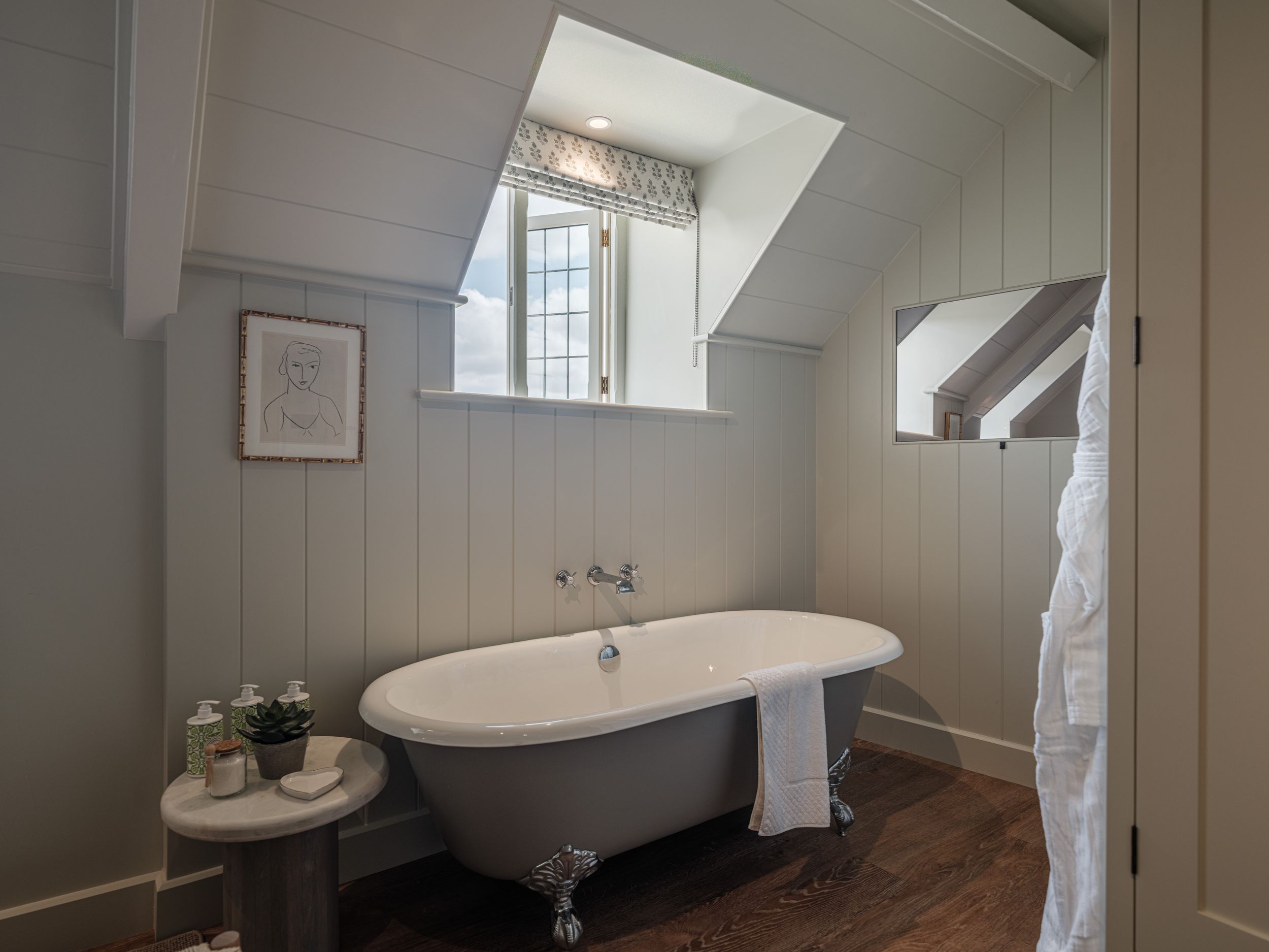 a stand alone bath tub in a cotswold cottage 
