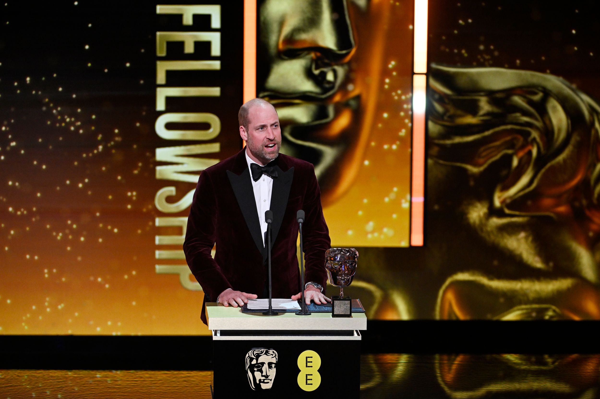Prince William presents the Fellowship Award on stage during the EE BAFTA Film Awards 2026