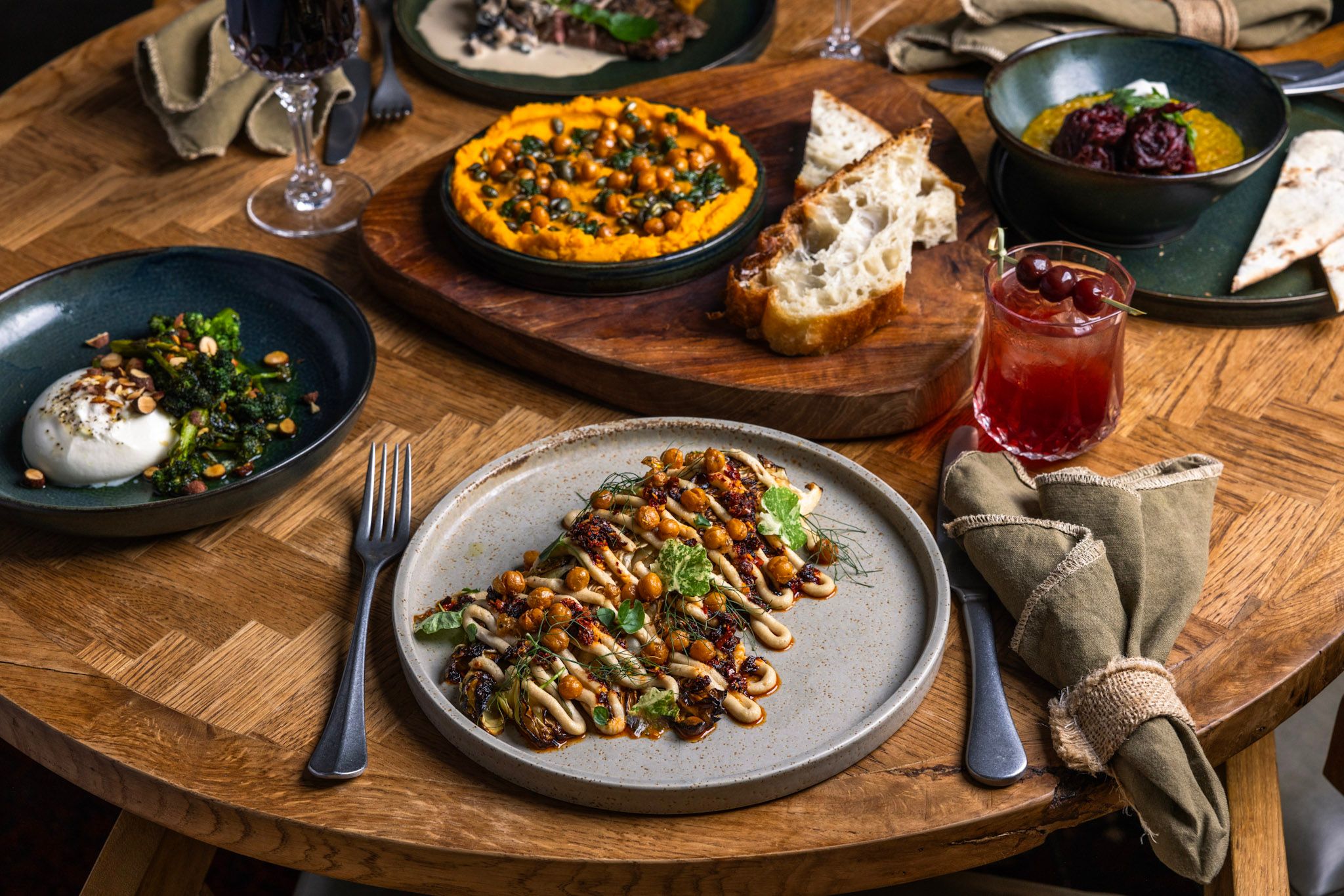 table full of plates of food