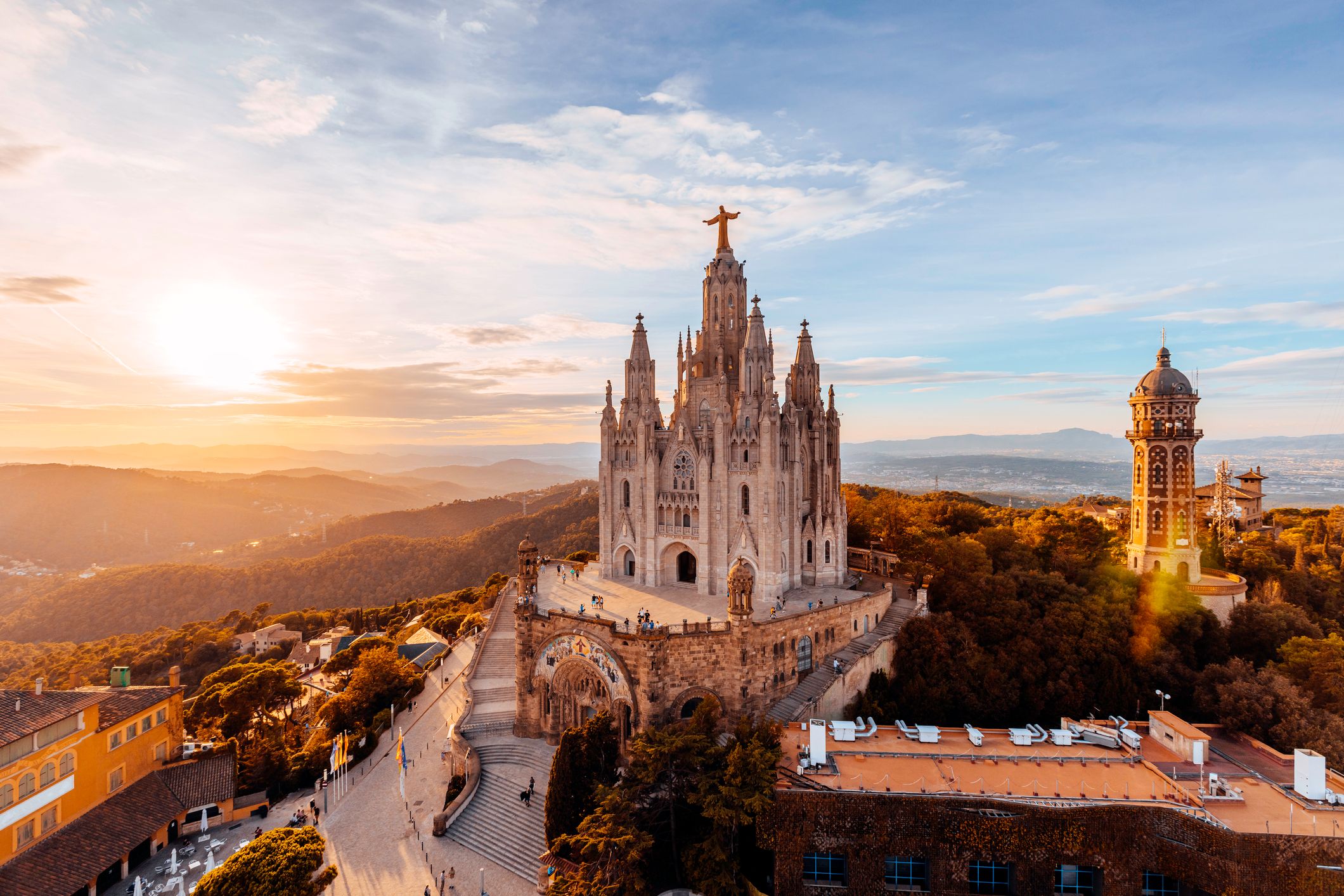 Tibidabo mountain and Sagrat Cor church at sunset, Barcelona, Spain