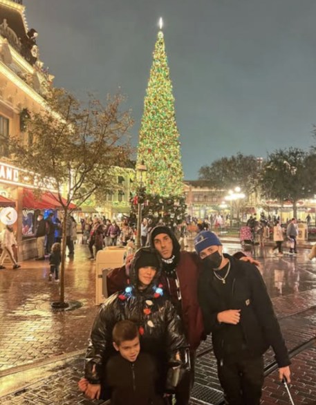 Kourtney at Disneyland with her family