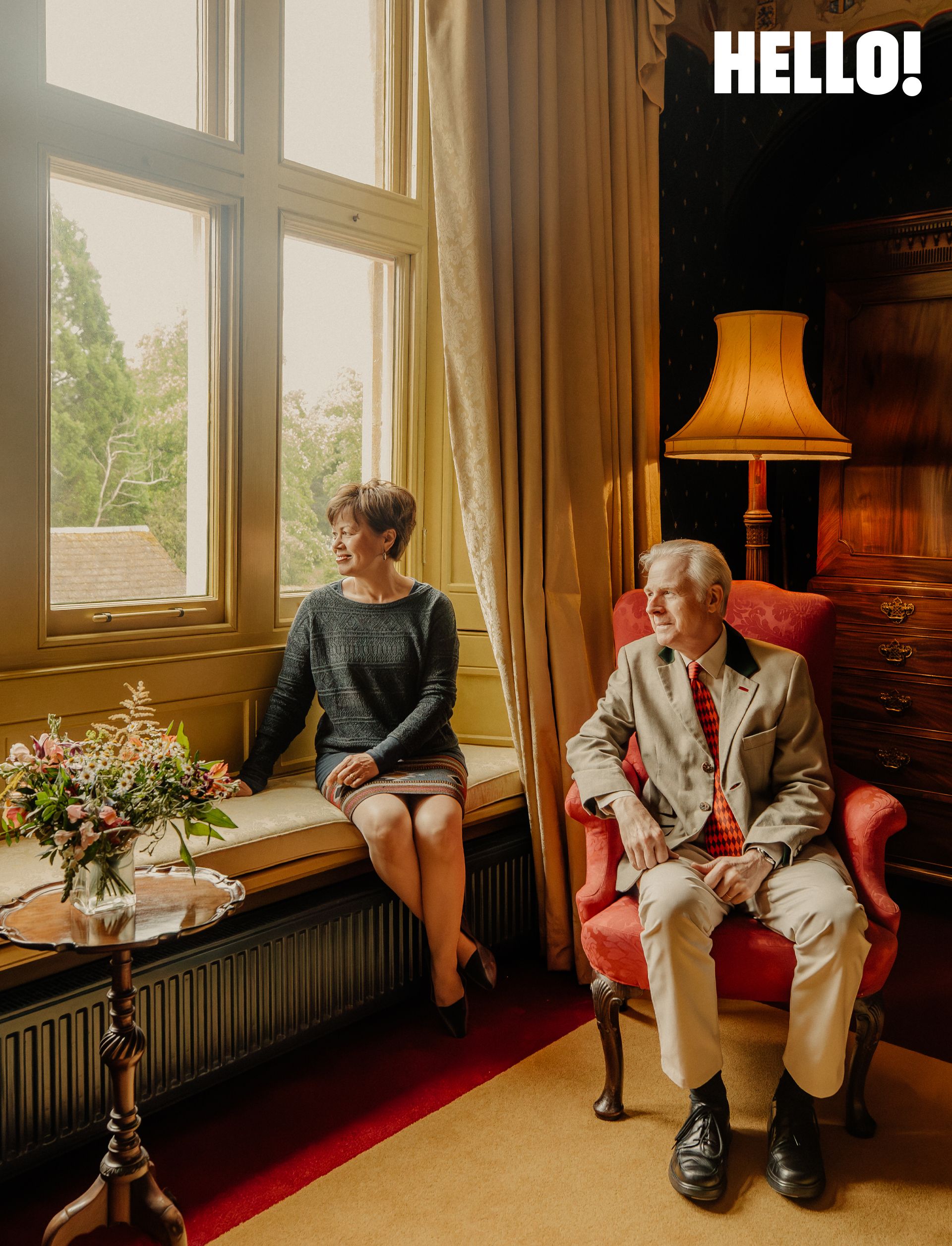 Ailsa and Ralph are looking out the window enjoying the view from the Heraldry Room 