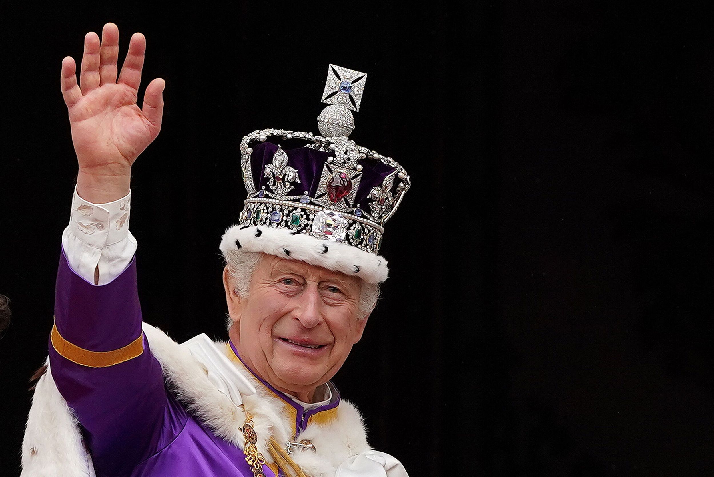 The King appeared on the balcony of Buckingham Palace wearing the Imperial State Crown following his coronation service