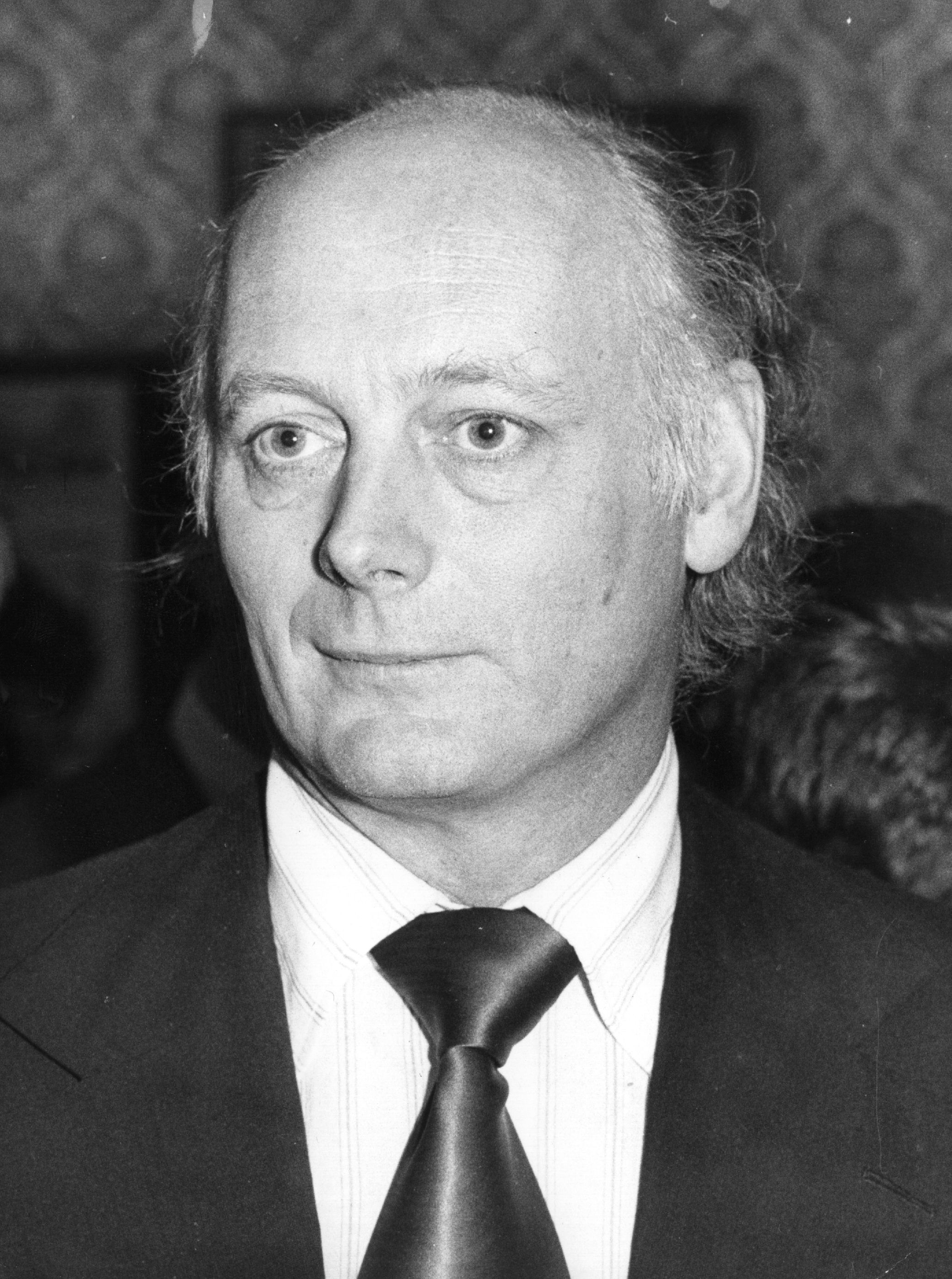 Lord Montagu of Beaulieu looking serious in a black tie 