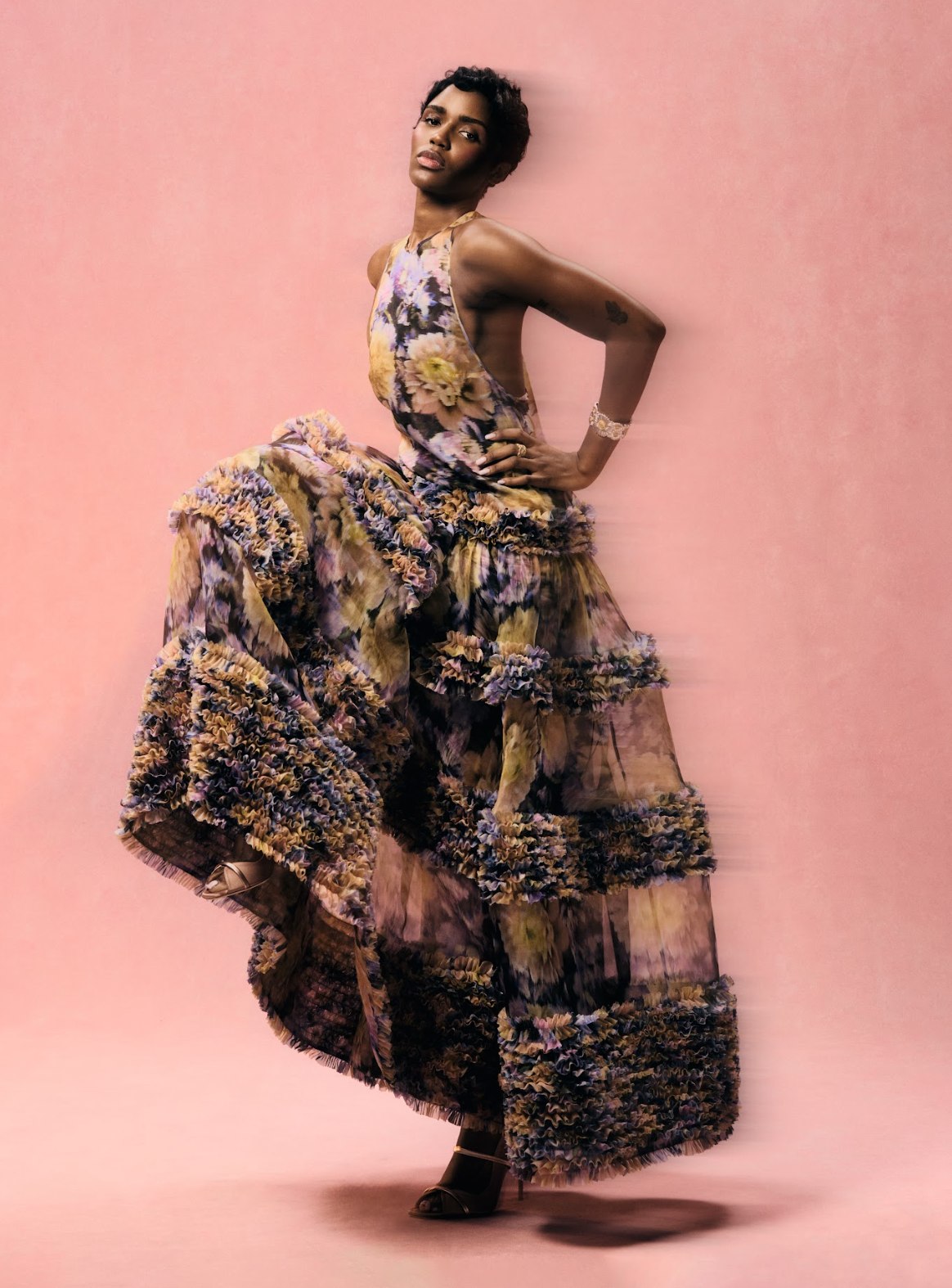 eva apio in ruffled dress