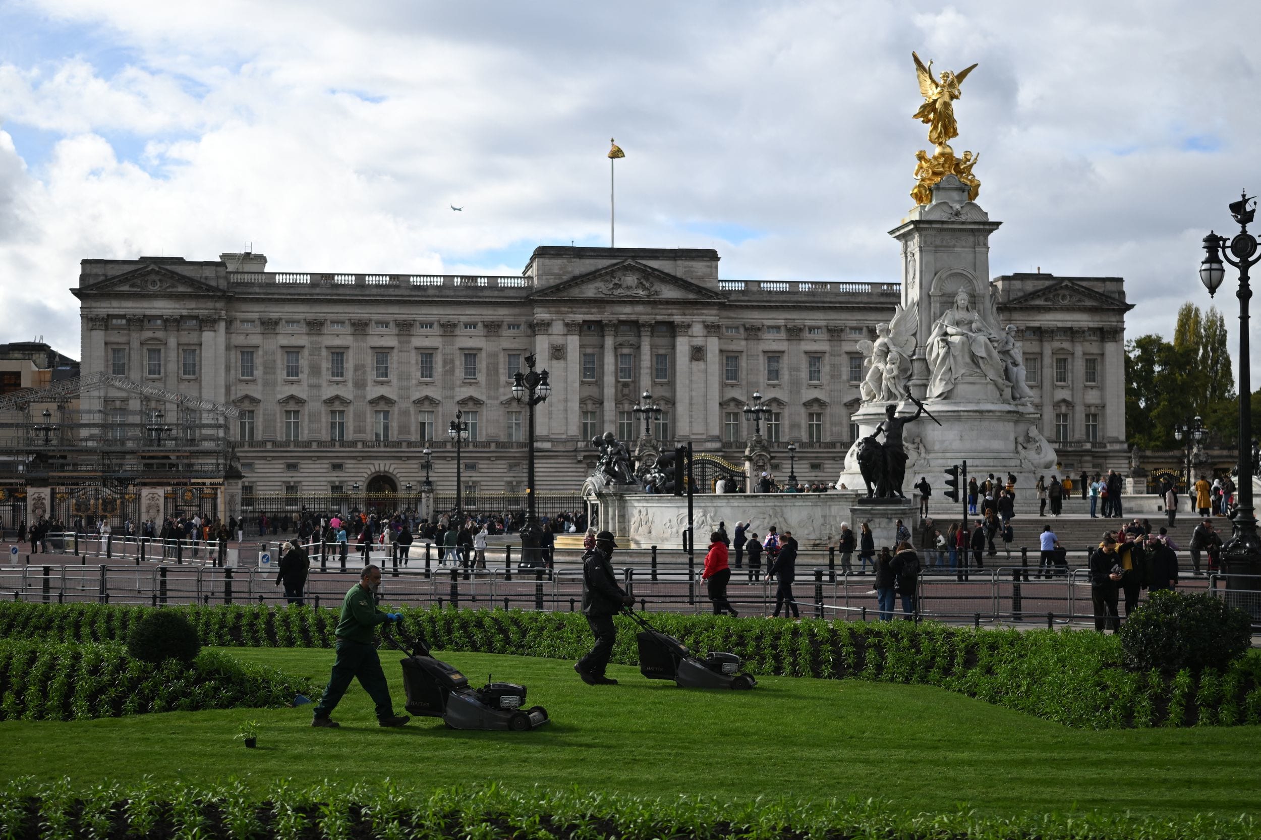 The Queen Victoria Memorial in front of the palace blocks the royals' view of The Mall