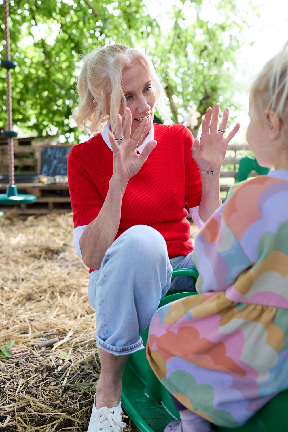 joely richardson speaking to child at community allotment project