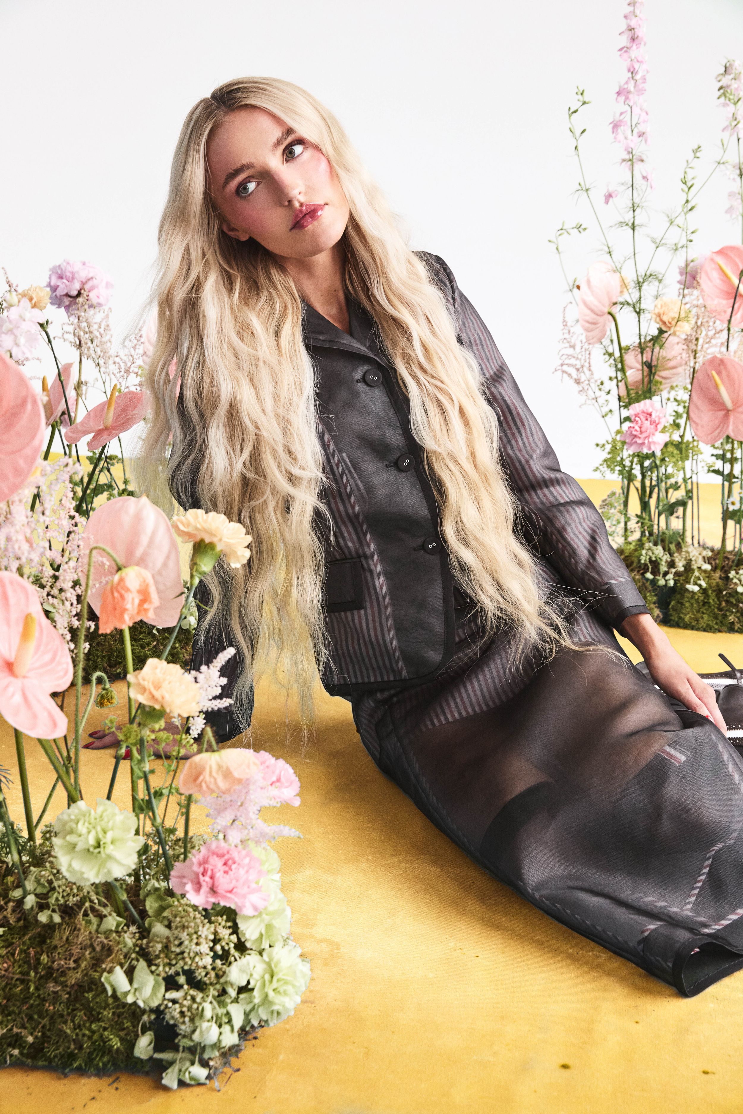 morgan riddle in Skirt: Silk Organza Pencil Skirt, £3,200, Thom Browne, Jacket: Silk Organza Sportcoat, £4,500, Thom Browne, Heels: Pebble Grain Criss Cross Thom John Heel, £850, Thom Browne, Socks: Lightweight Cotton 4-Bar Over-the-Calf Sock, £150, Thom Browne