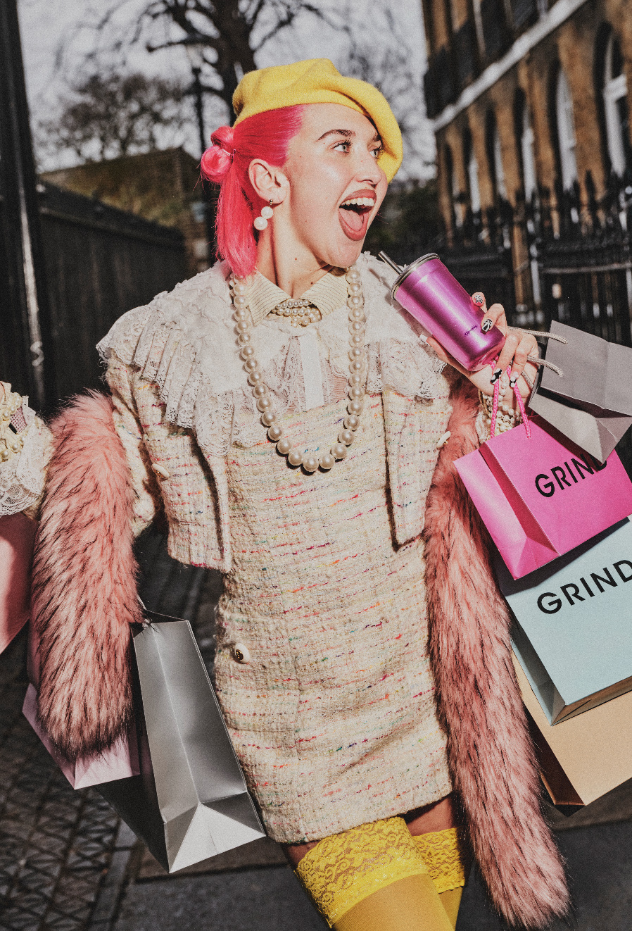 A model poses for a photo with the new Clueless x Grind collab