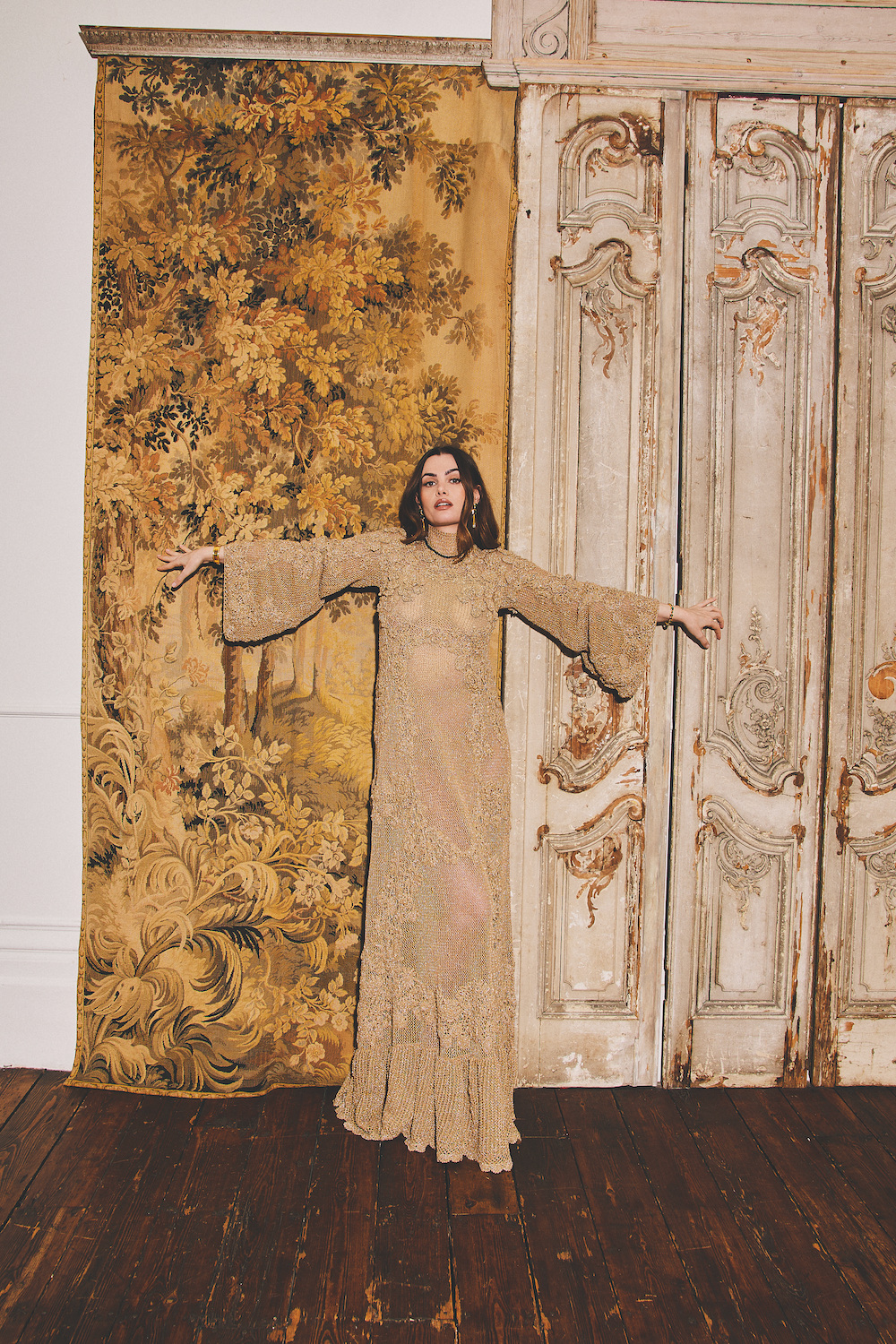 Dress, £2,718, Ulla Johnson, Earrings, £360, Necklace, £225, (right hand) Bangle, £630, (left hand) Bracelet, £630, all Thomas Sabo