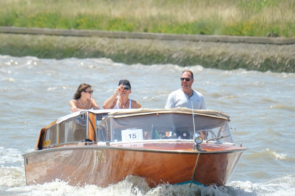 Orlando Bloom and Vittoria Ceretti heading for Venice airport in a boat