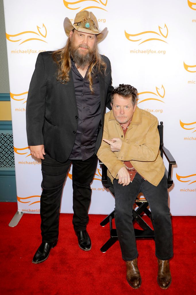 Chris Stapleton and Michael J. Fox attend "A Country Thing Happened on the Way to Cure Parkinson's" benefitting The Michael J. Fox Foundation at The Fisher Center for the Performing Arts on April 16, 2025 in Nashville, Tennessee