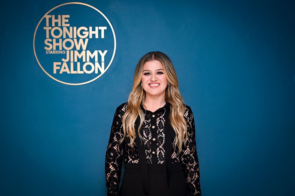 kelly clarkson wearing black lace jumpsuit