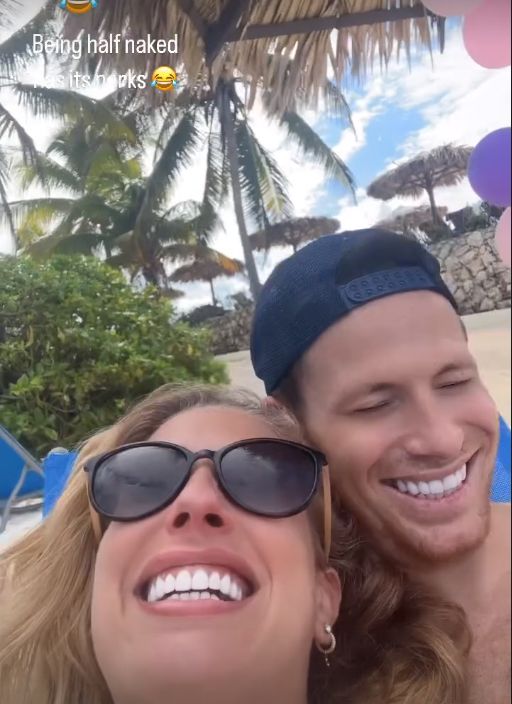 Stacey Solomon and Joe Swash on the beach