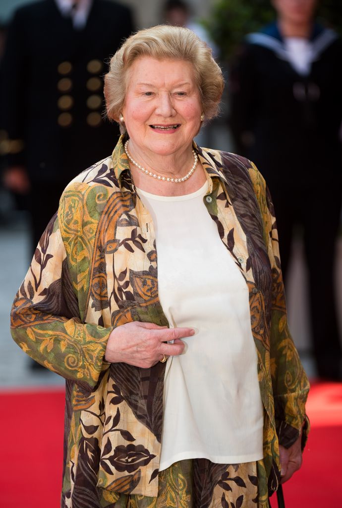 Dame Patricia Routledge in a floral outfit