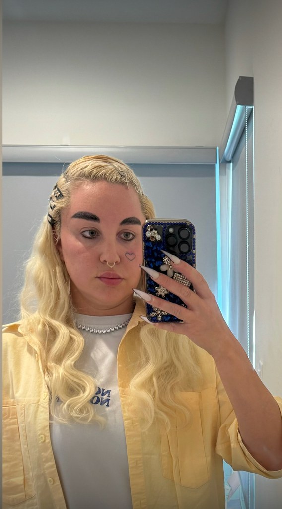 Amanda Bynes takes a selfie inside her home, shared on OnlyFans