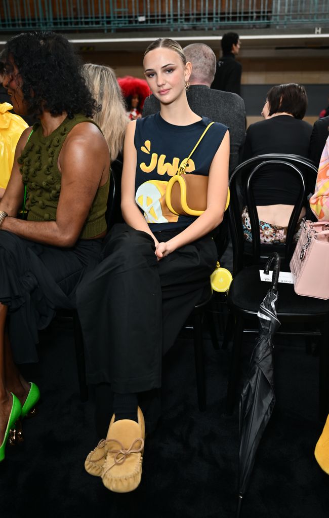 Gen Z fashion icon Mia Regan attended the JW Anderson AW24 show in a logo t-shirt and donned what we predict will be this year's hottest shoe trend. 