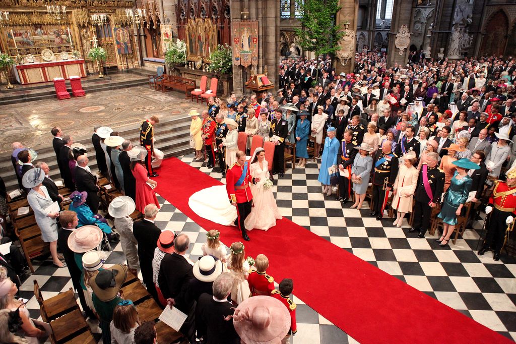 Prince William and his new bride Kate Middleton walk down the aisle at the close of their wedding ceremony at Westminster Abbey