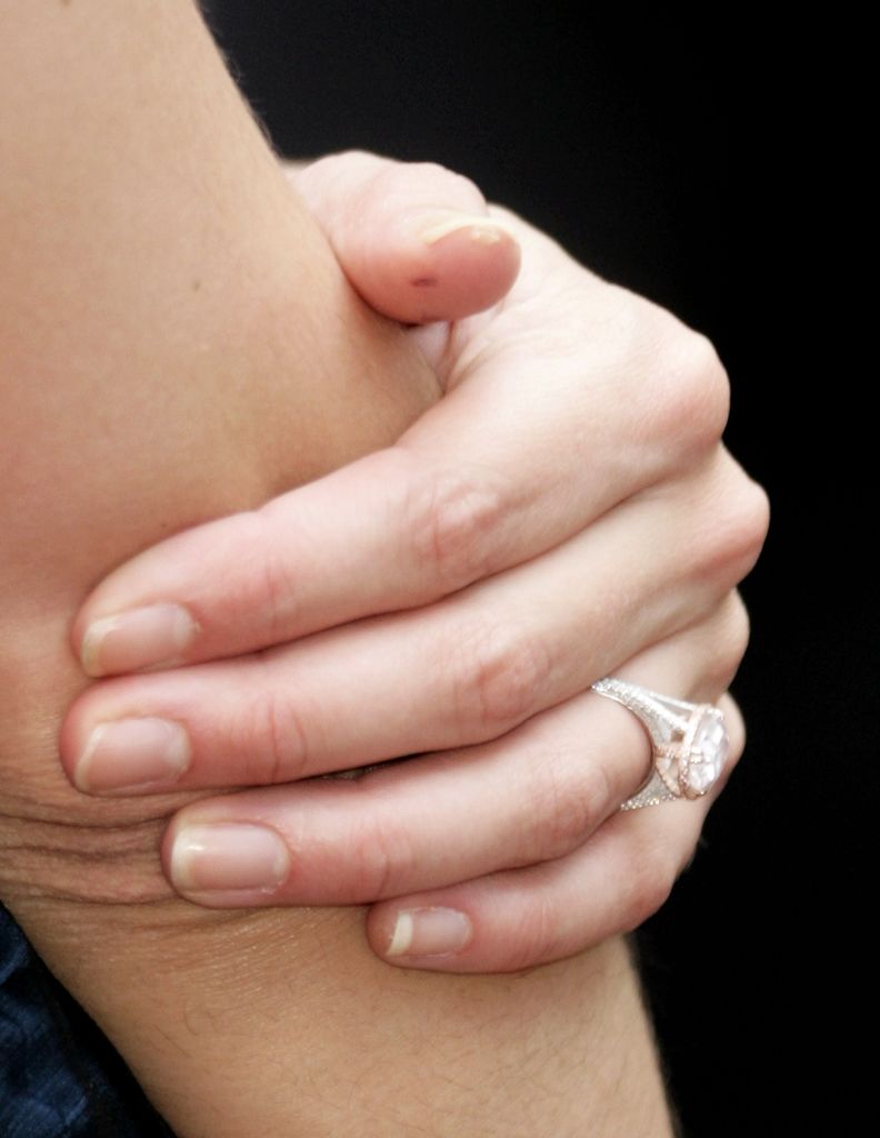 diamond ring on katie holmes' hand close up