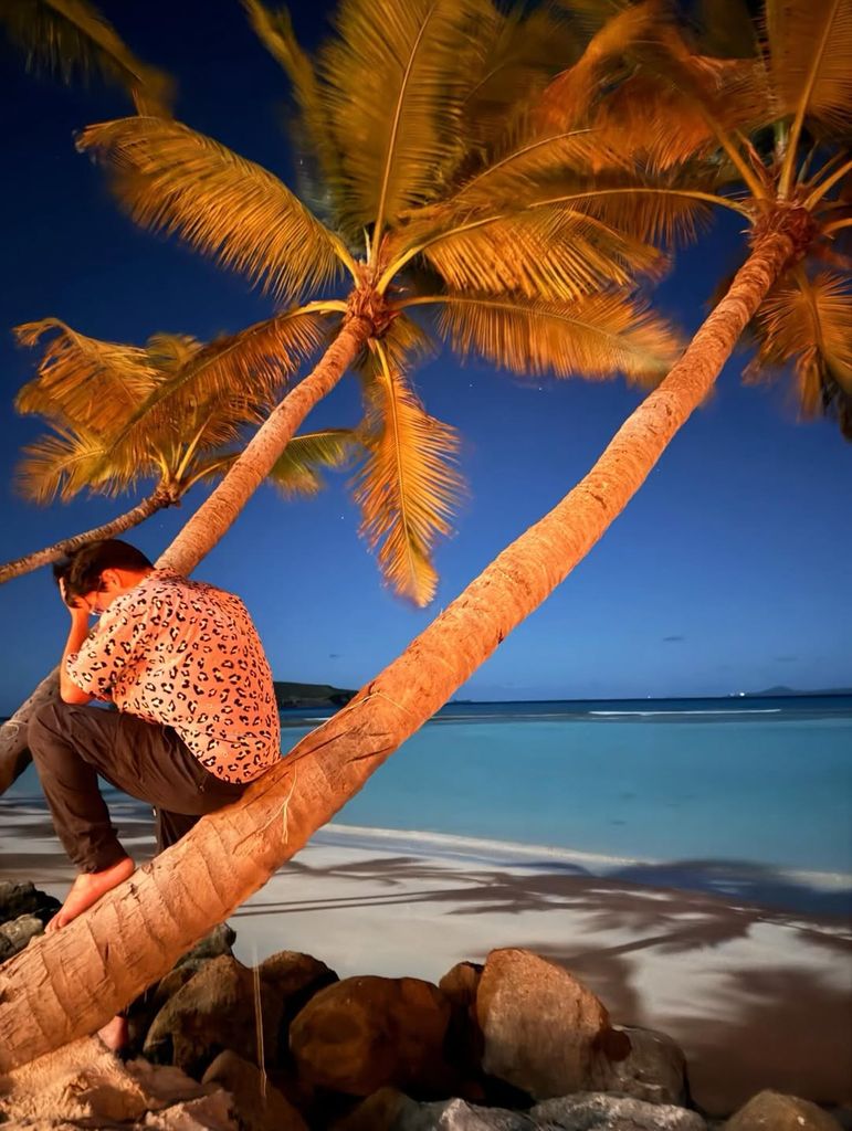 Kelly Ripa's son Michael posed on the beach in a photo from his family's recent vacation 