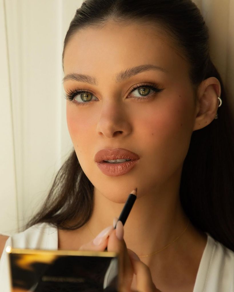 Her nude lip was crafted using VBB's lip liner in the shade '02.'