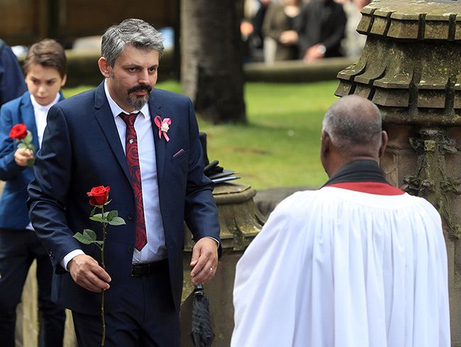 saffie roussus dad attends funeral carrying single rose